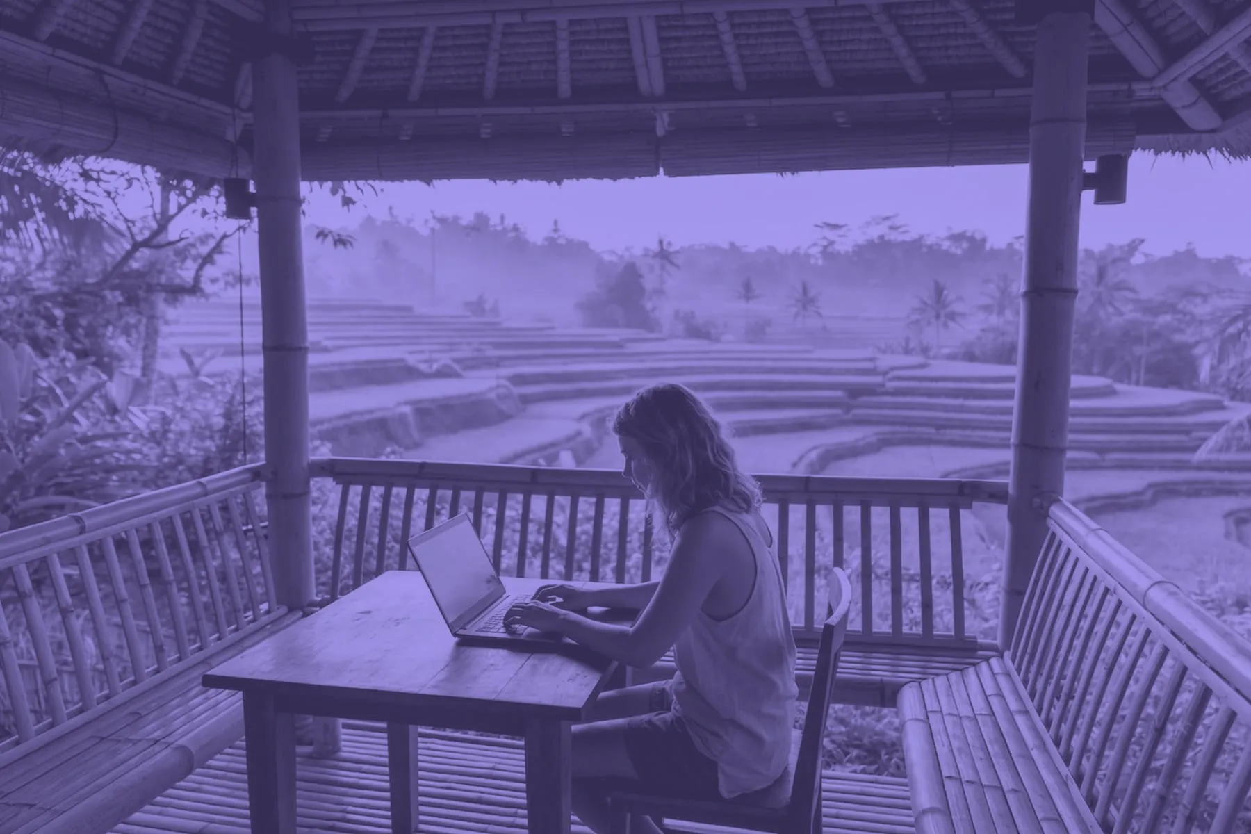 Someone working on a laptop in Bali
